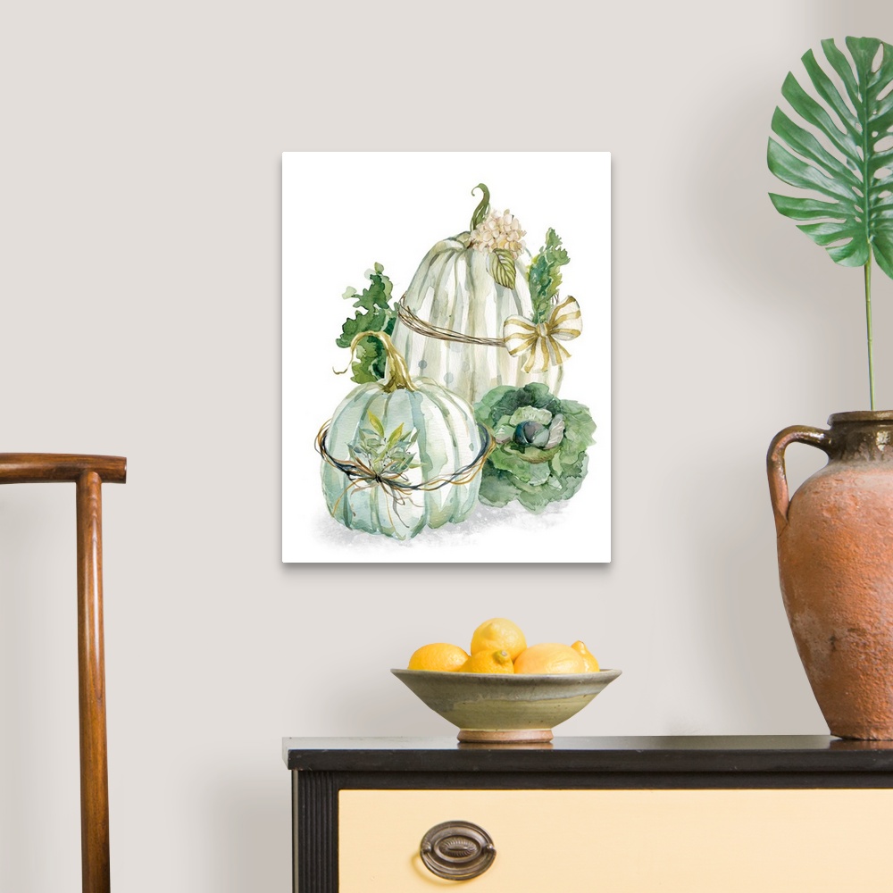 A traditional room featuring Vertical watercolor painting of two harvest pumpkins wrapped with a bow and greenery on a white b...