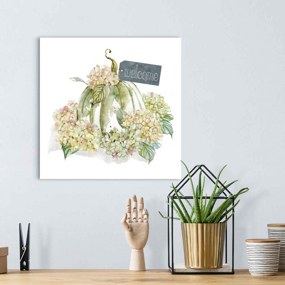 A bohemian room featuring Square harvest decor with watercolor hydrangeas and a pumpkin with a tag on it that reads "Welcome"