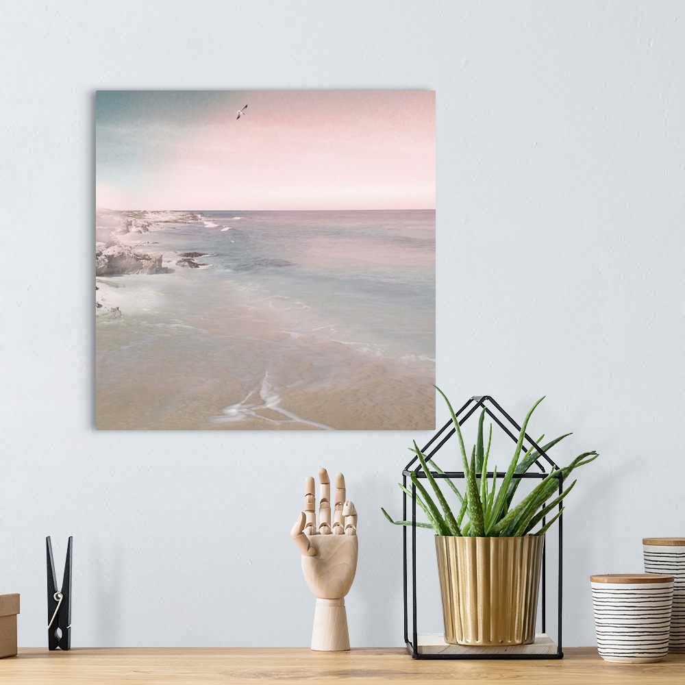 A bohemian room featuring Contemporary painting of an ocean shore with shallow waves in the evening.