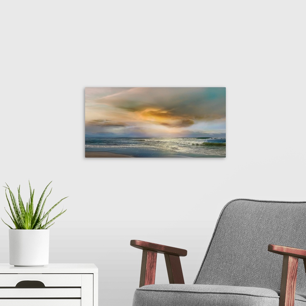 A modern room featuring Large photograph of gentle waves on a beach with a colorful sunset.