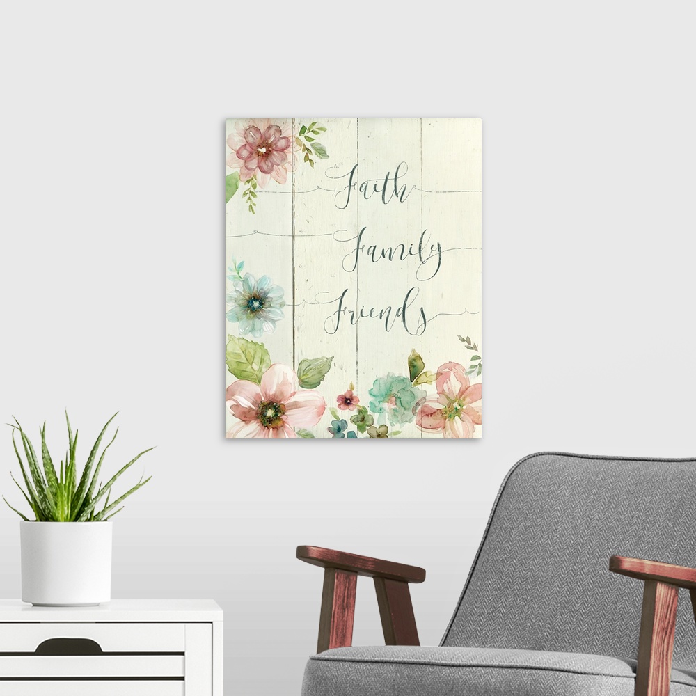 A modern room featuring Decorative watercolor artwork of a group of flowers with the text "Faith Family Friends".