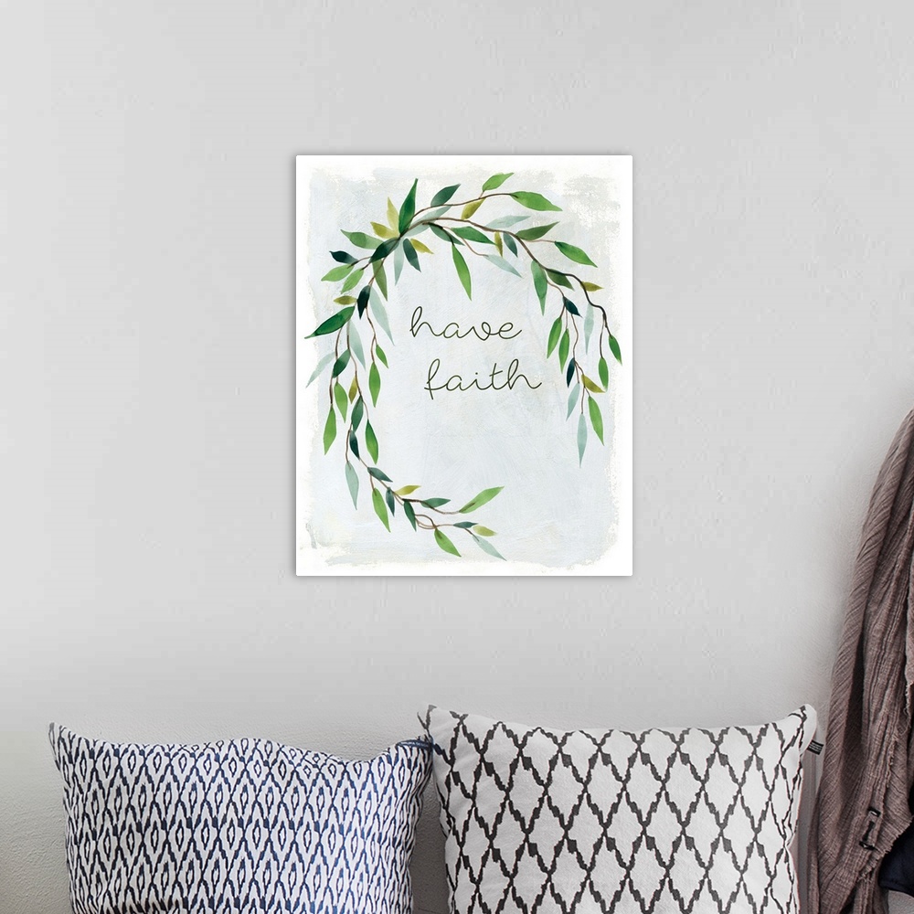 A bohemian room featuring "Have Faith" placed on a white textured background with leaves surrounding it.