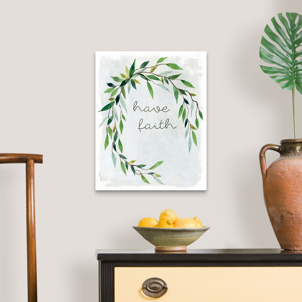 A traditional room featuring "Have Faith" placed on a white textured background with leaves surrounding it.