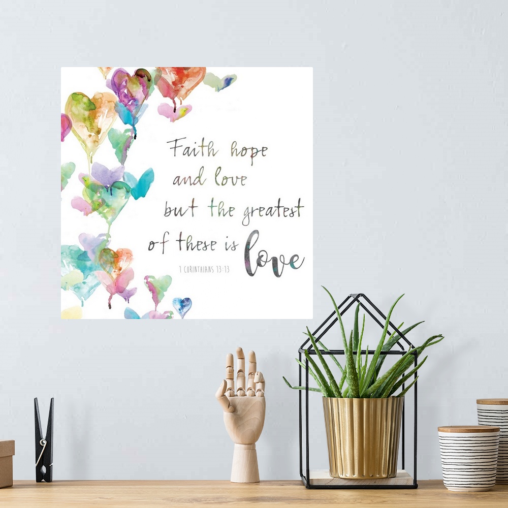 A bohemian room featuring "Faith, hope and love. But the greatest of these is love, 1 Corinthians 13:13" placed on a white ...
