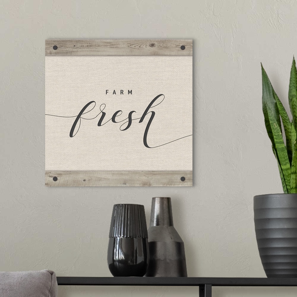 A modern room featuring 'Farm fresh' neutral colored square sign.