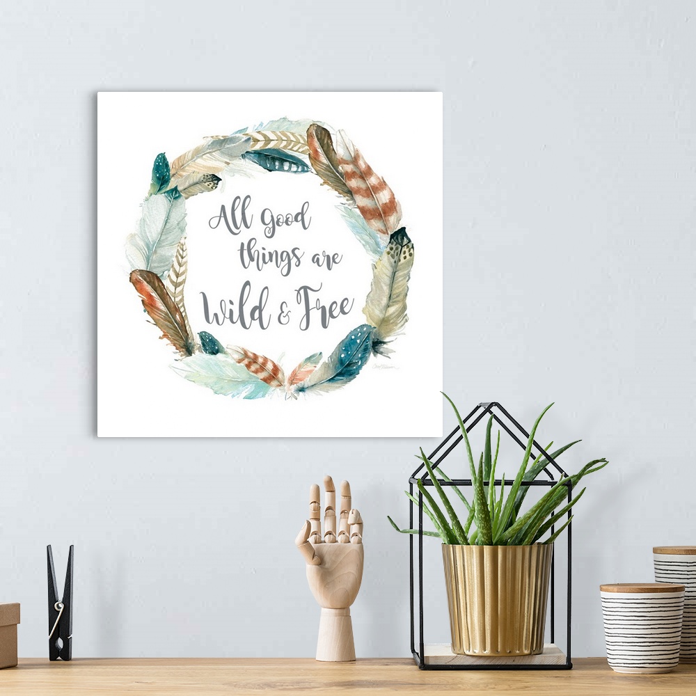 A bohemian room featuring Square watercolor painting with a wreath made of feathers and the phrase "All Good Things Are Wil...