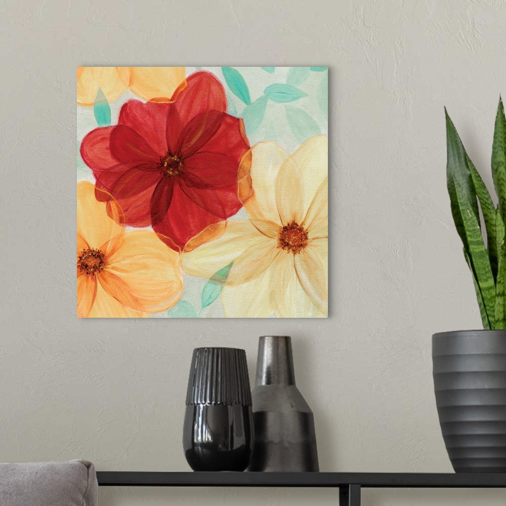 A modern room featuring Watercolor artwork of flowers in sunny shades of red and orange.