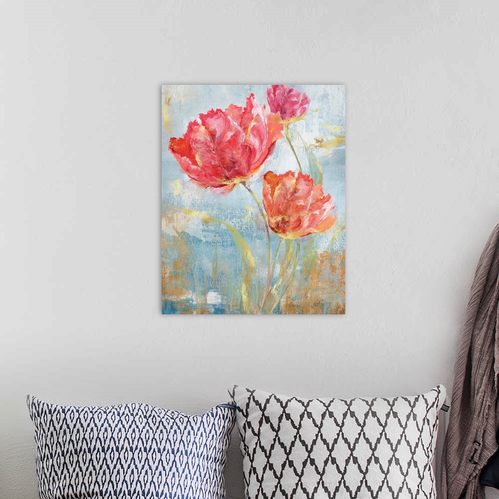 A bohemian room featuring Large contemporary abstract painting of pink flowers on a blue background with gold highlights an...