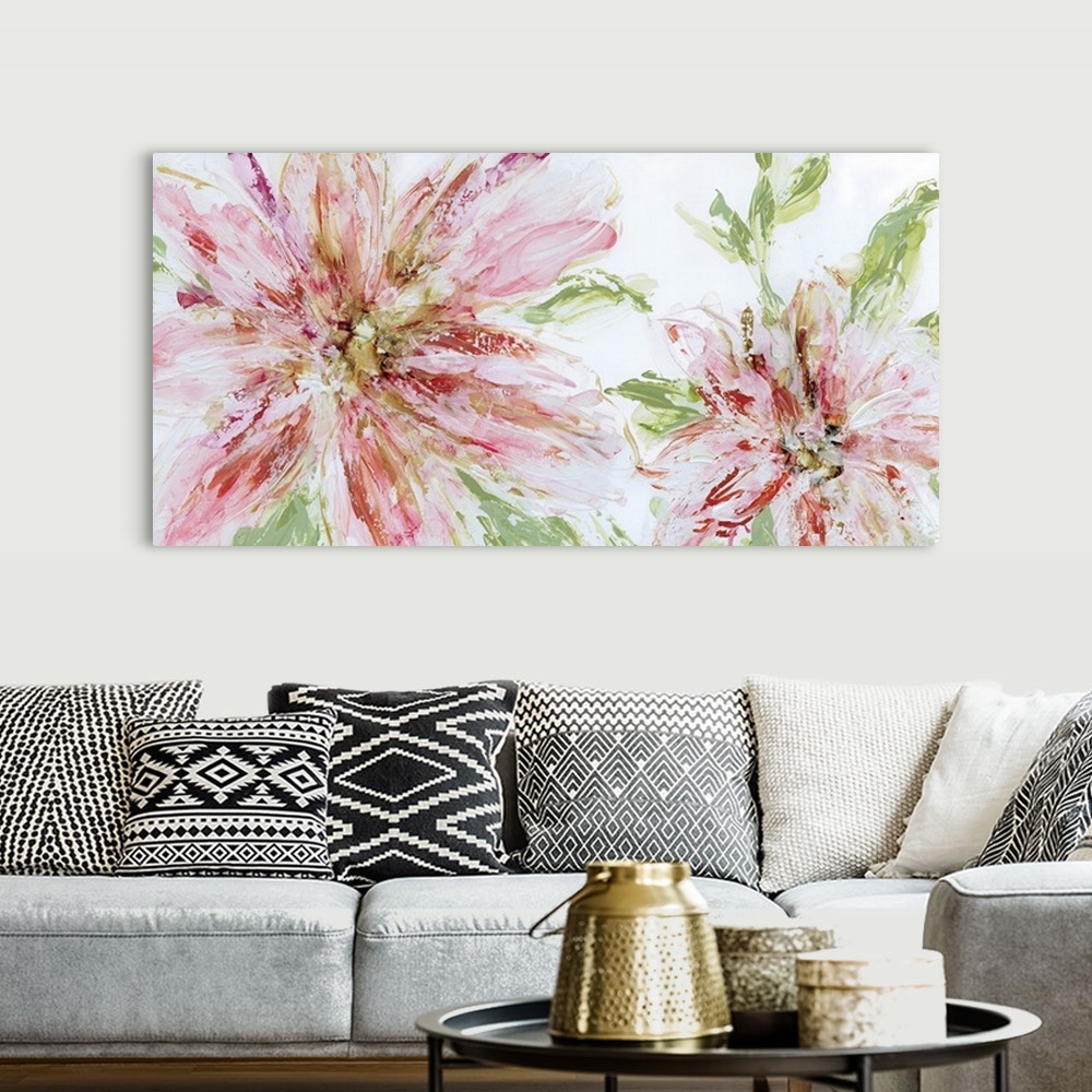 A bohemian room featuring Large painting of two abstract flowers in shades of pink and red with green leaves on a white bac...