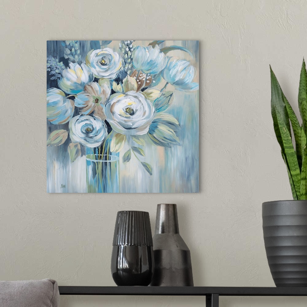A modern room featuring Contemporary painting of blue flowers in a glass vase.