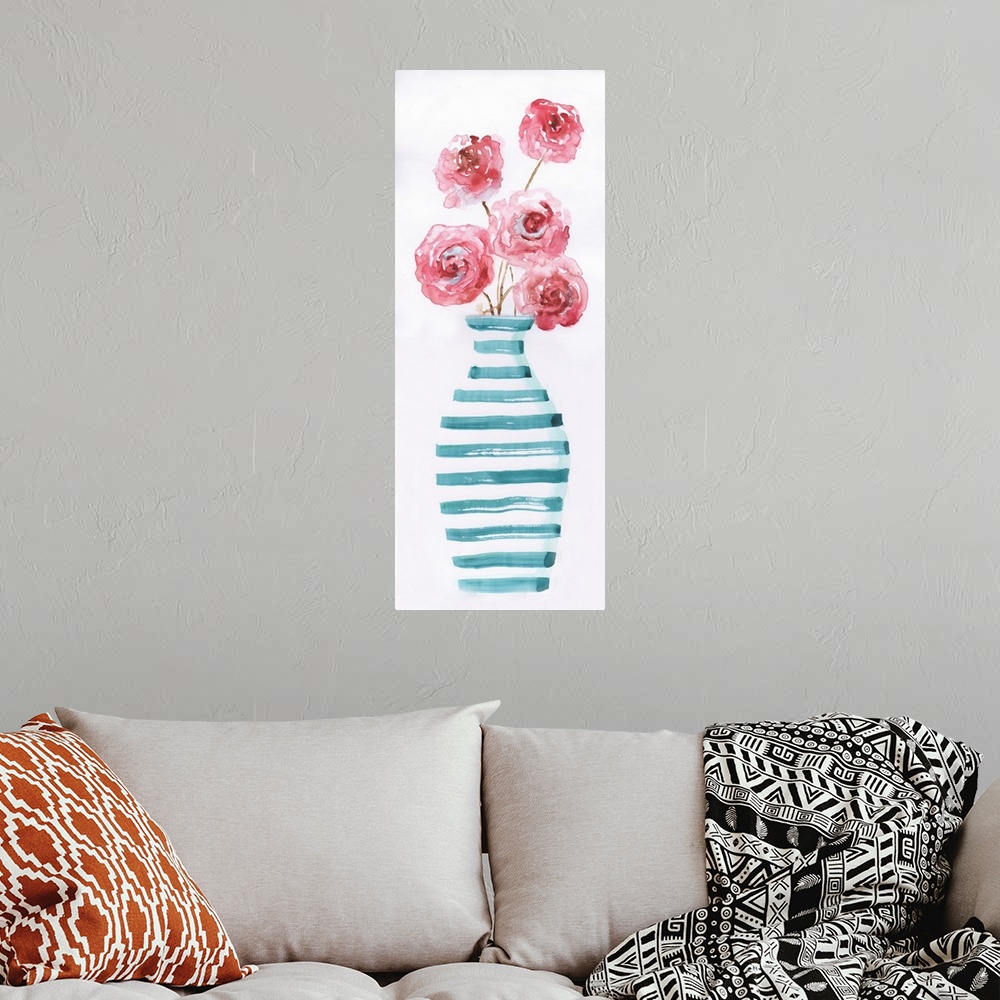 A bohemian room featuring Large panel watercolor painting of pink flowers arranged in a blue and white striped vase on a so...
