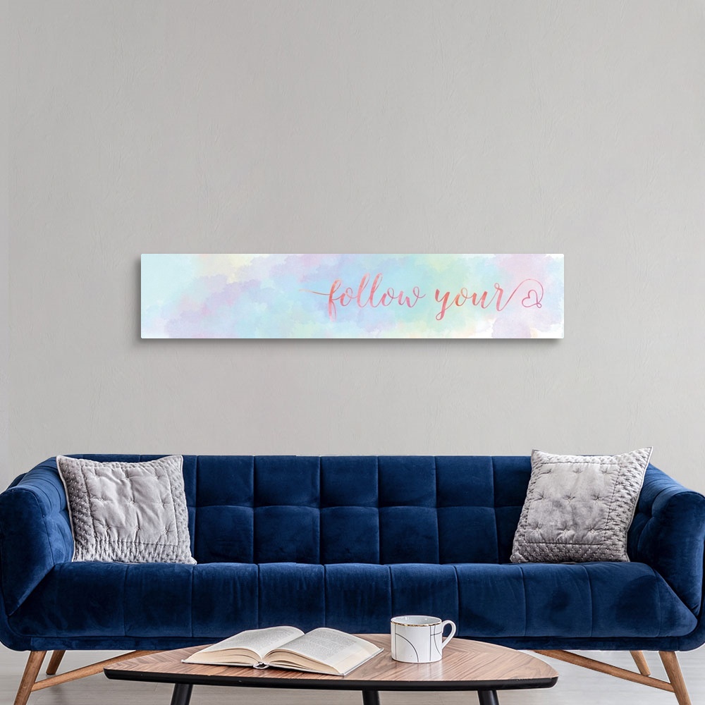 A modern room featuring A long horizontal design of pastel colors with the words "Follow your" and a heart shape.