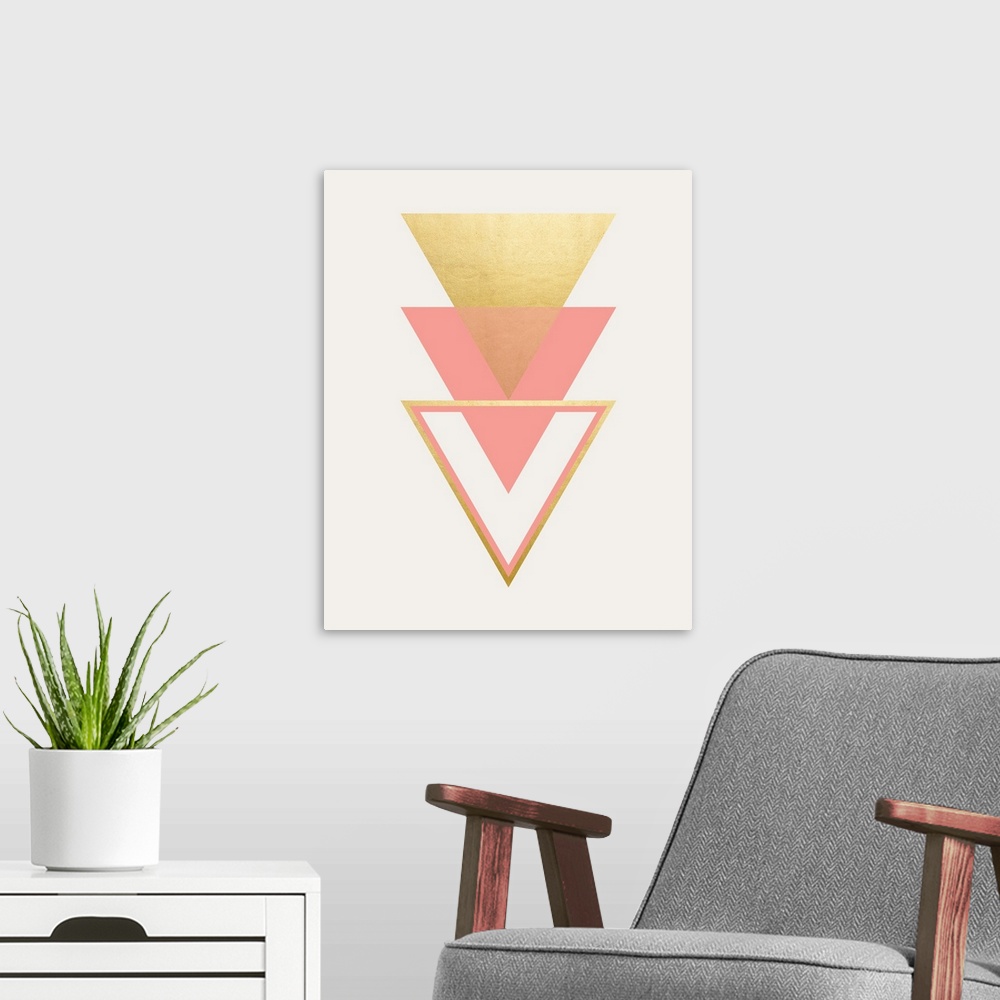A modern room featuring A vertical geometric design of a trio of triangles in pink and gold.