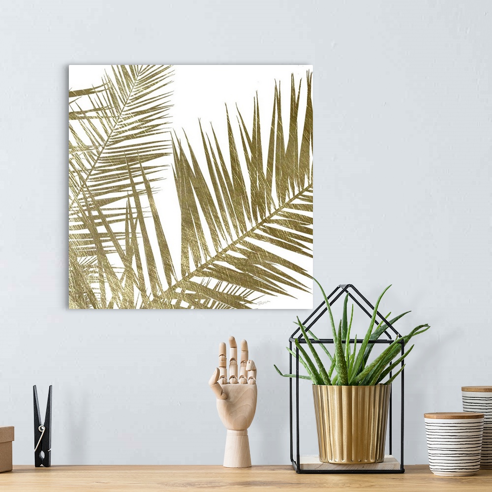 A bohemian room featuring Square art with gold metallic palm fronds on a solid white background.