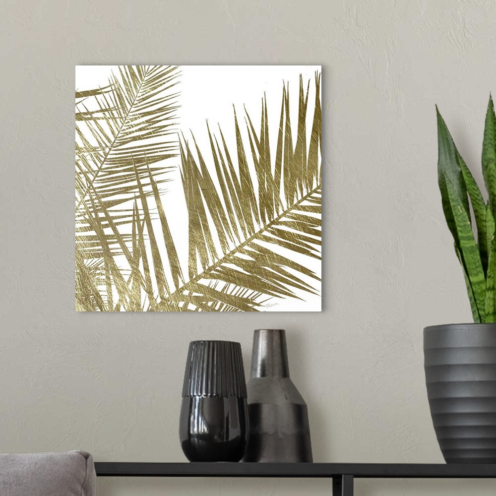 A modern room featuring Square art with gold metallic palm fronds on a solid white background.