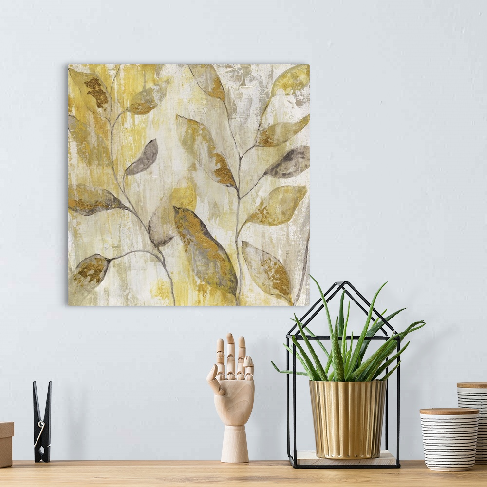 A bohemian room featuring Semi-abstract contemporary art print of golden leaves.