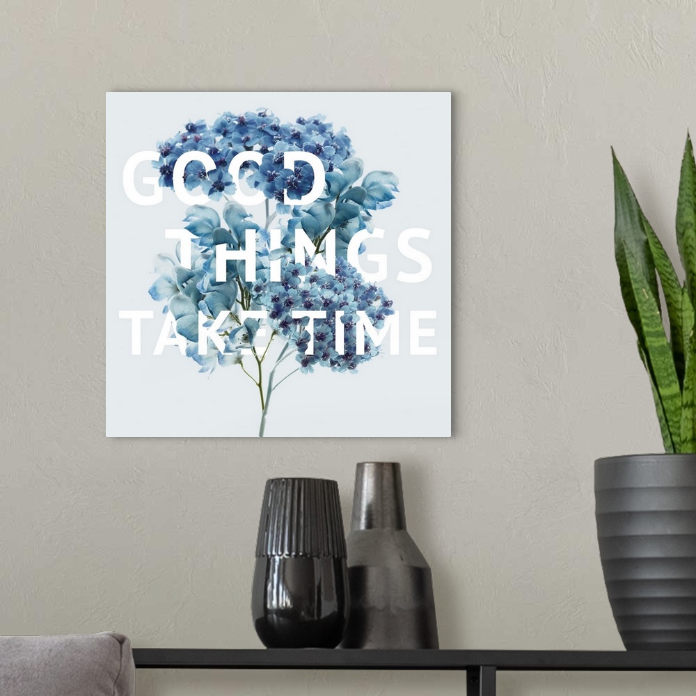 A modern room featuring Good Things Take Time
