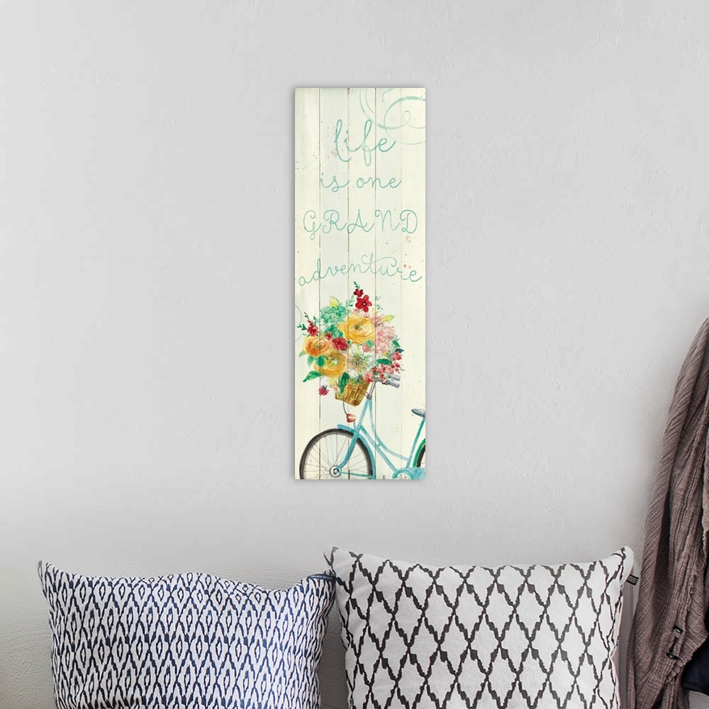 A bohemian room featuring "Life is a Grand Adventure" written in blue on a faux wood background with an illustration of a b...