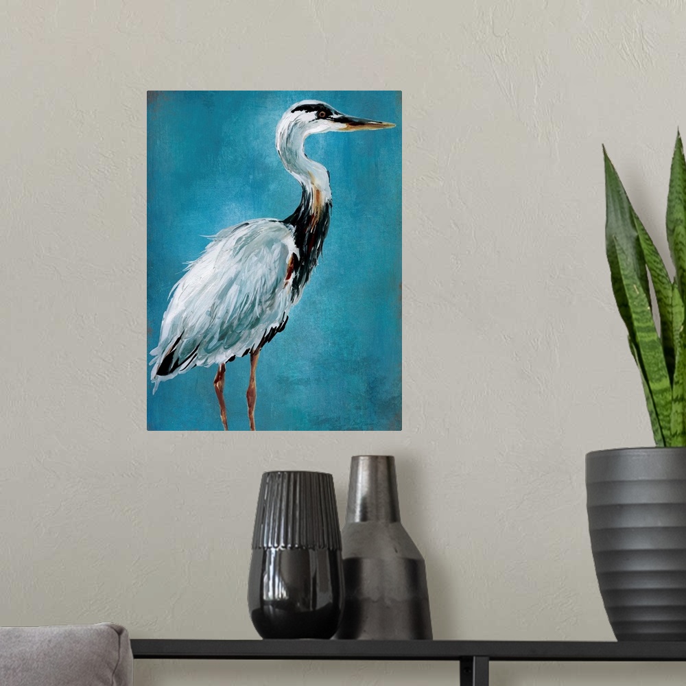 A modern room featuring Contemporary painting of a blue heron on a blue background.