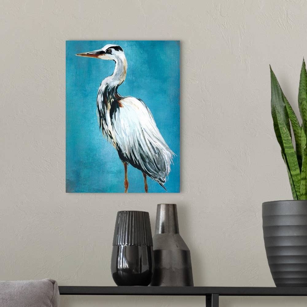 A modern room featuring Contemporary painting of a blue heron on a blue background.