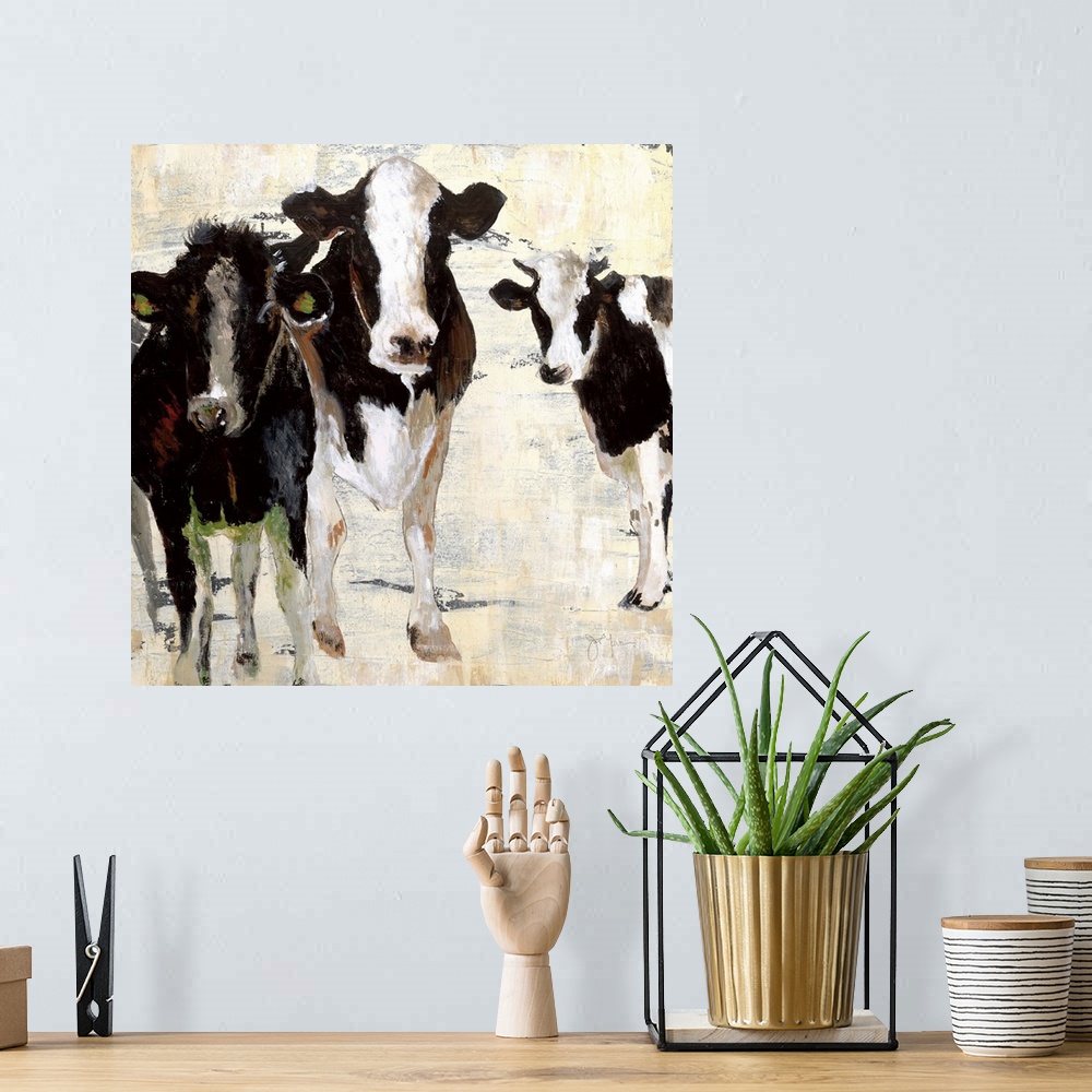 A bohemian room featuring A contemporary painting of three cows standing together using all natural colors with hints of gr...