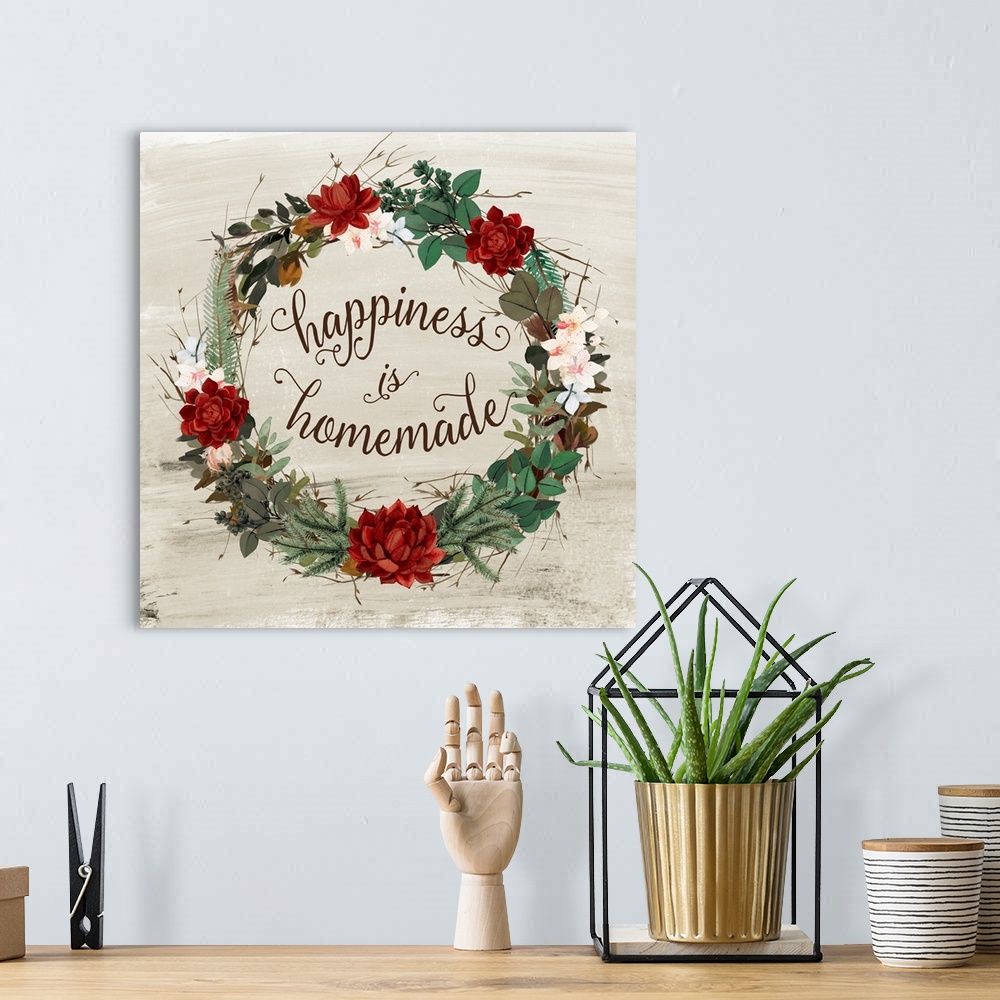 A bohemian room featuring A wreath of red succulents, flowers and various foliage  surround the words, "Happiness is homema...