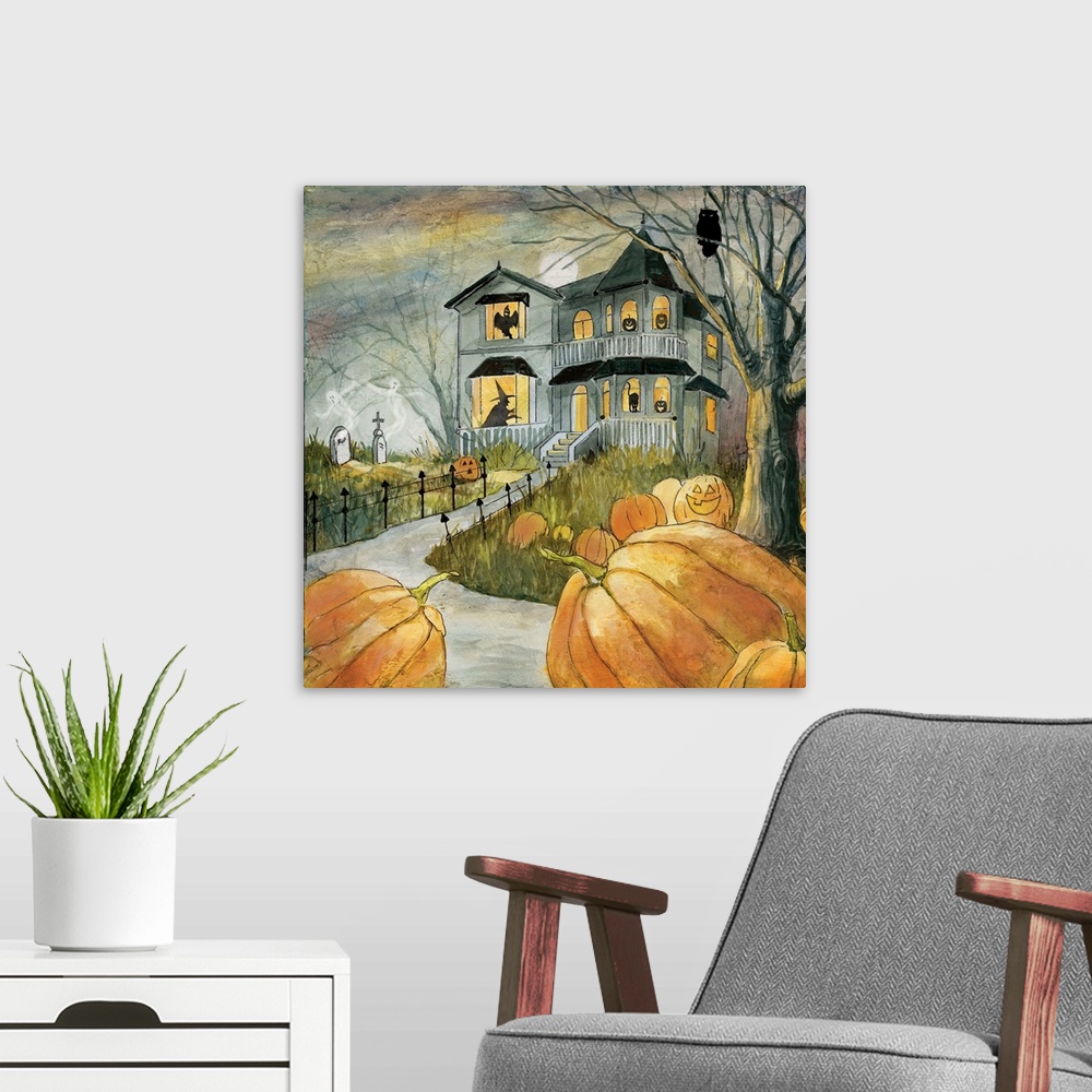 A modern room featuring A spooky haunted house with figures in the windows surrounded by pumpkins.