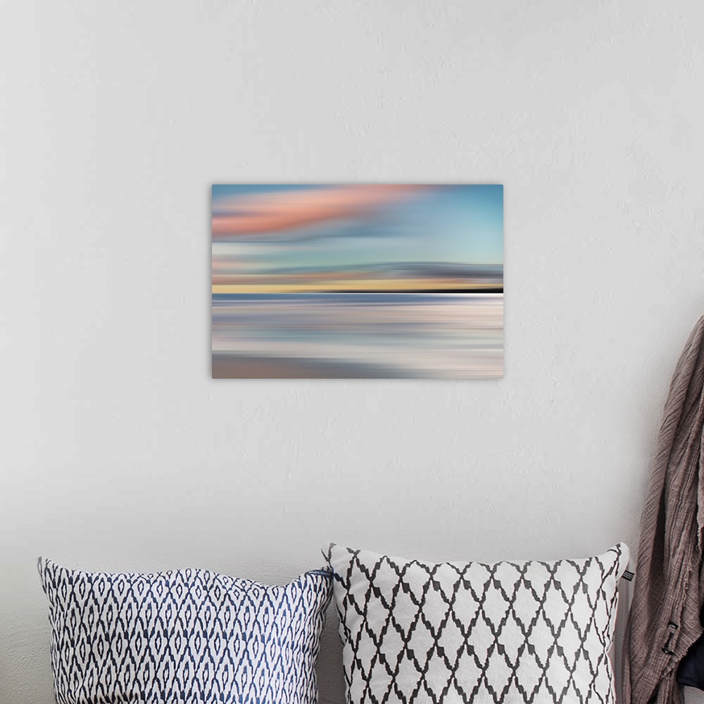 A bohemian room featuring Abstract photograph of a colorful landscape made with horizontal movement and pastel colors.