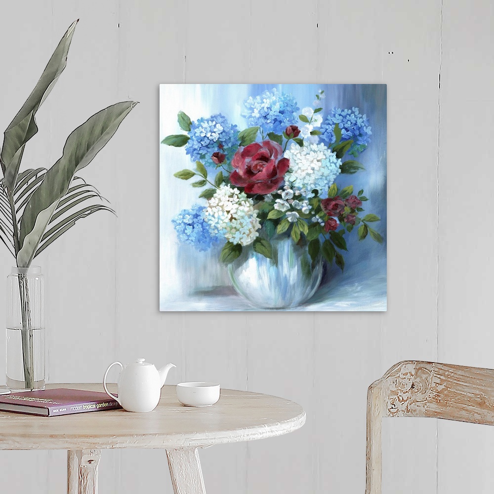 A farmhouse room featuring Square still life painting of a floral arrangement with blue tones.