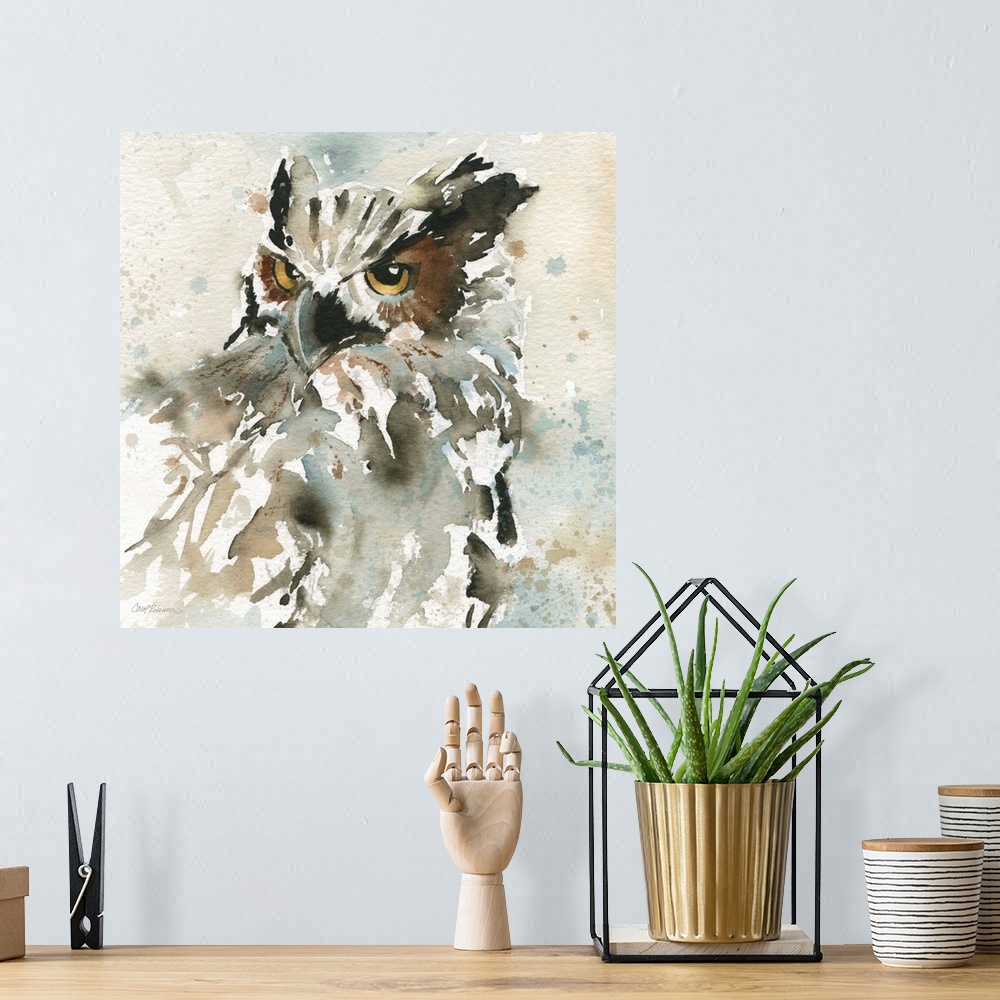 A bohemian room featuring A watercolor painting of an abstract owl with a neutral background that has paint splattered on it.