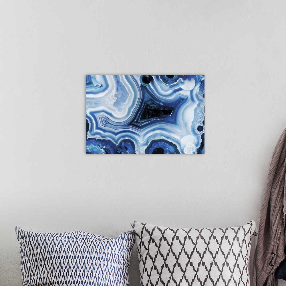 A bohemian room featuring Abstract art of blue agate.