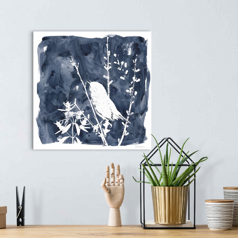 A bohemian room featuring Square watercolor painting of a white silhouetted bird and plants on an indigo background with a ...