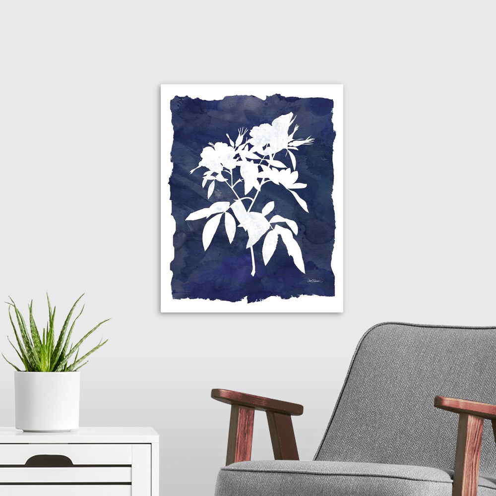 A modern room featuring Cyanotype with white silhouetted flowers on an indigo background with a white boarder.