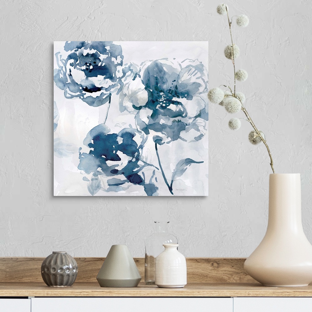 A farmhouse room featuring A square abstract watercolor painting of blue flowers.