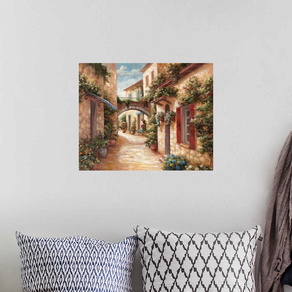 A bohemian room featuring A traditional style painting of a cobblestone alleyway in an Italian village, with doors and wind...