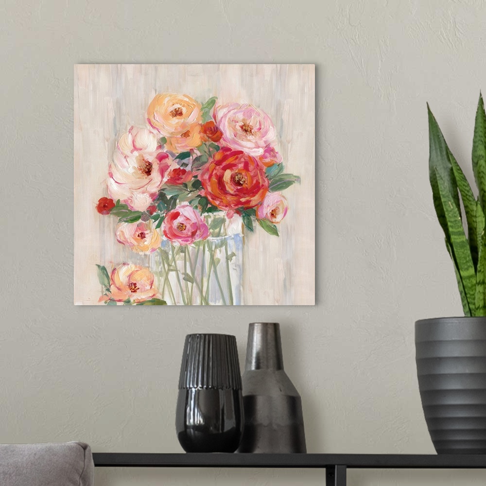 A modern room featuring Square painting of pink, orange, and red flowers neatly arranged in a glass vase on a neutral col...