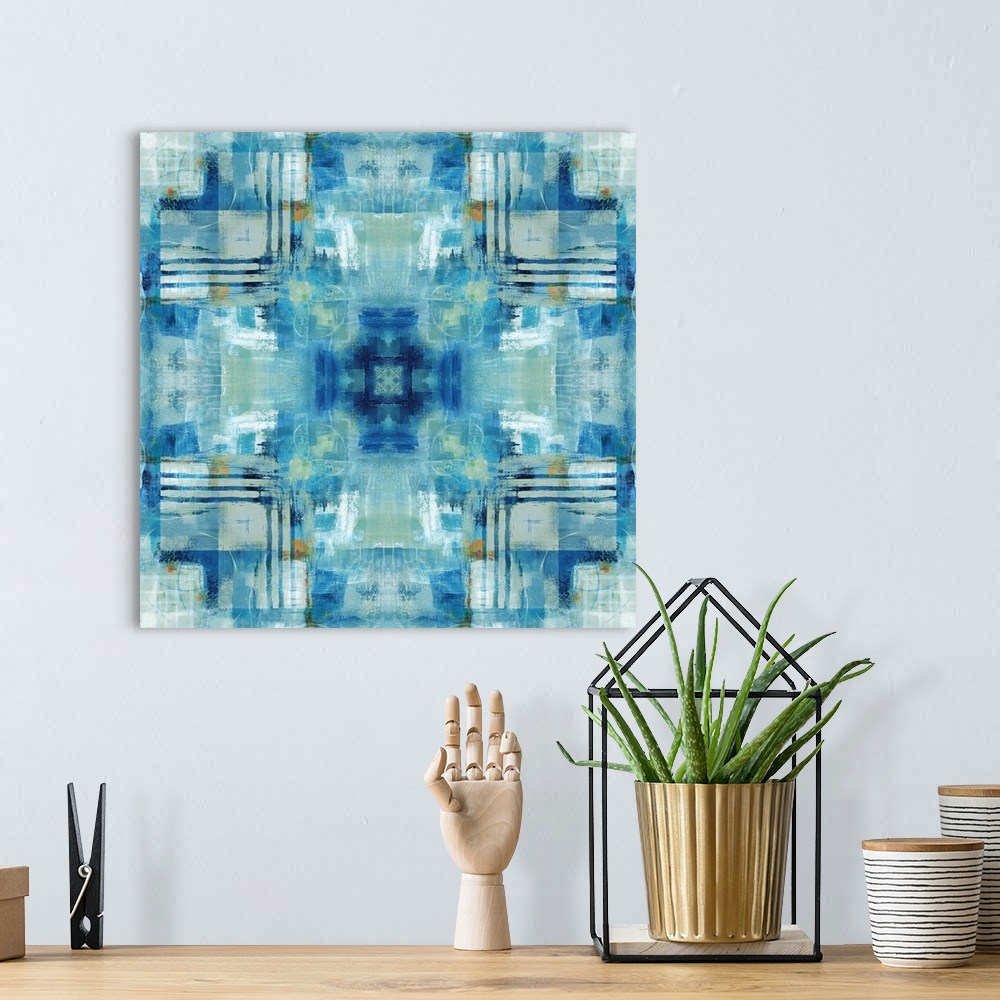 A bohemian room featuring Large square painting made with shades of blue, green, white, and gold and patterns resembling a ...