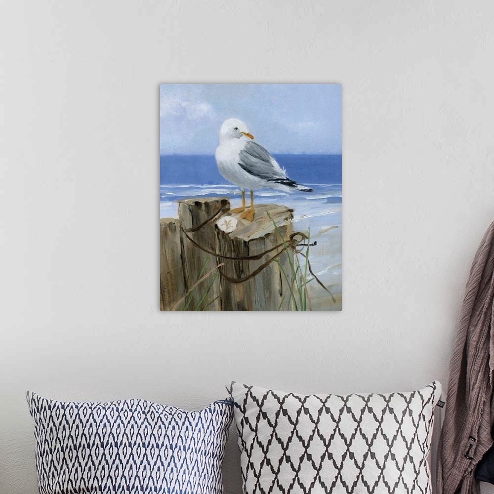 A bohemian room featuring Contemporary painting of a seagull perched on a wooden post with a sand dollar and the ocean in t...