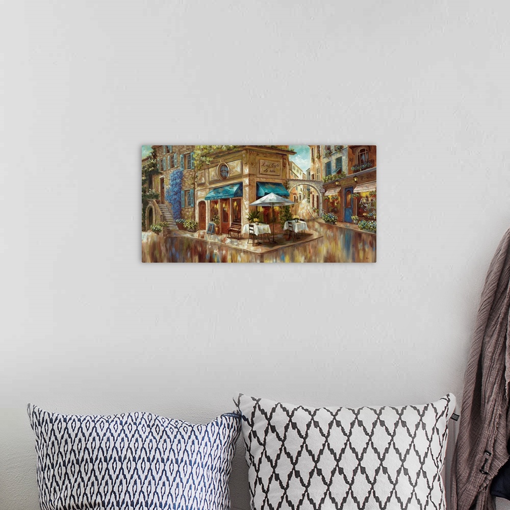 A bohemian room featuring Contemporary painting of a cafe on a cute French street corner.