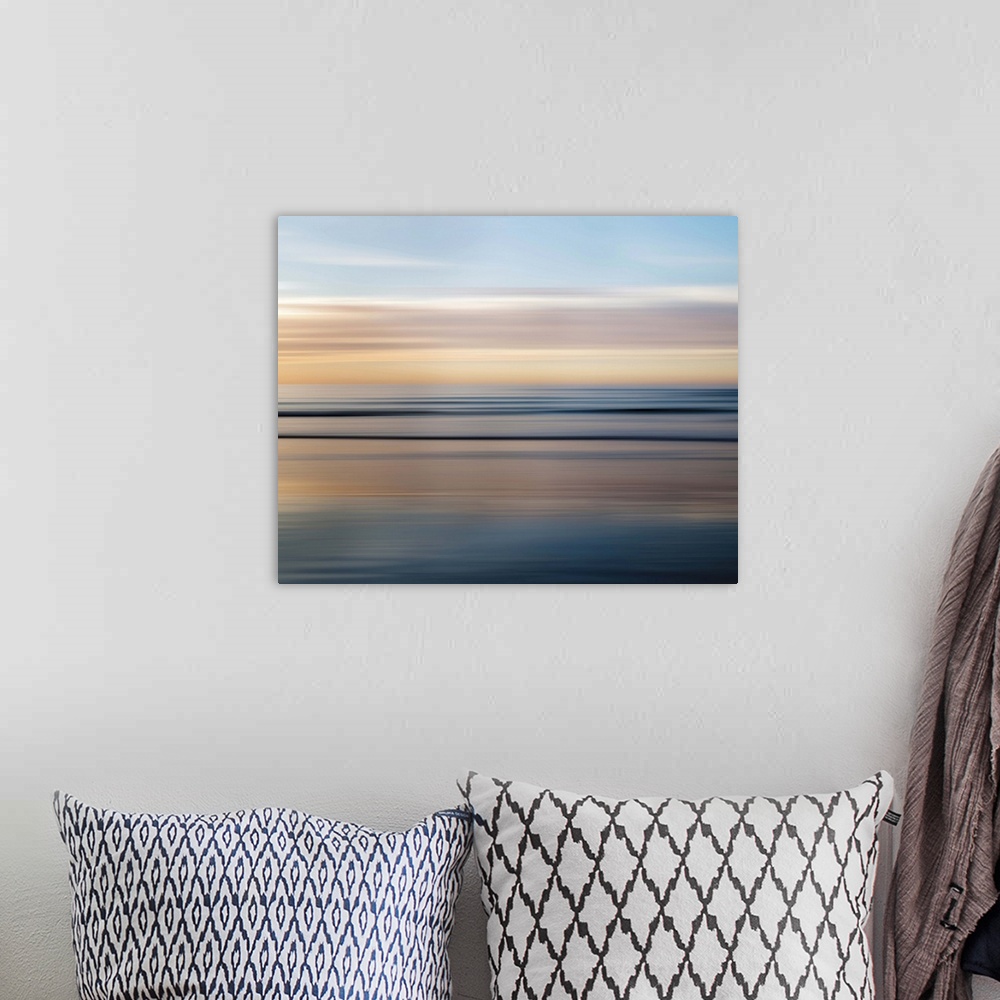 A bohemian room featuring Abstract photograph of a dreamy seascape.