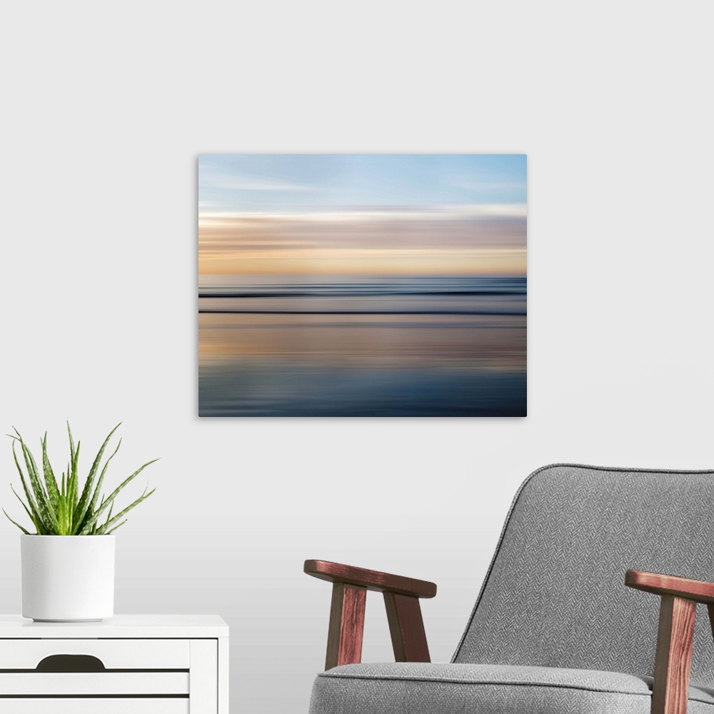 A modern room featuring Abstract photograph of a dreamy seascape.