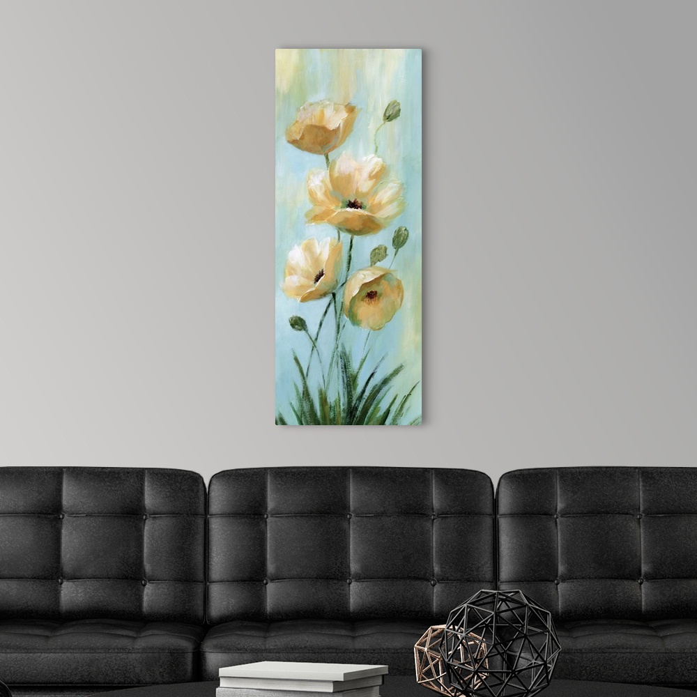 A modern room featuring Vertical painting of blooming yellow flowers against pale blue.
