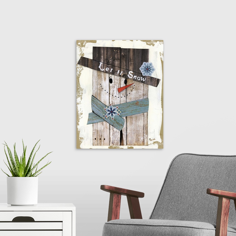 A modern room featuring A decorative winter painting of a snowman made out of wood that says ?Let it Snow? on its top hat.