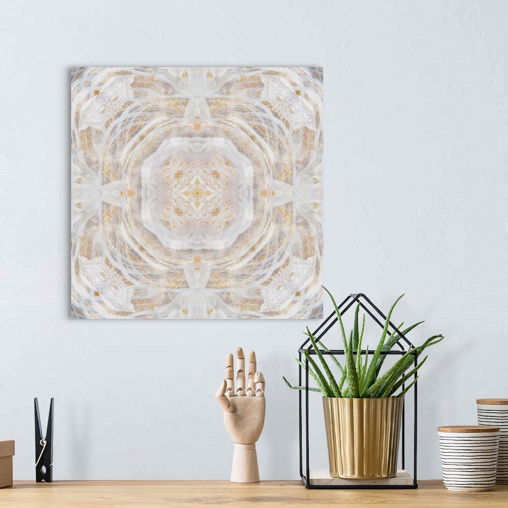 A bohemian room featuring Silver, cream, and gold abstract decor resembling a view through a kaleidoscope.
