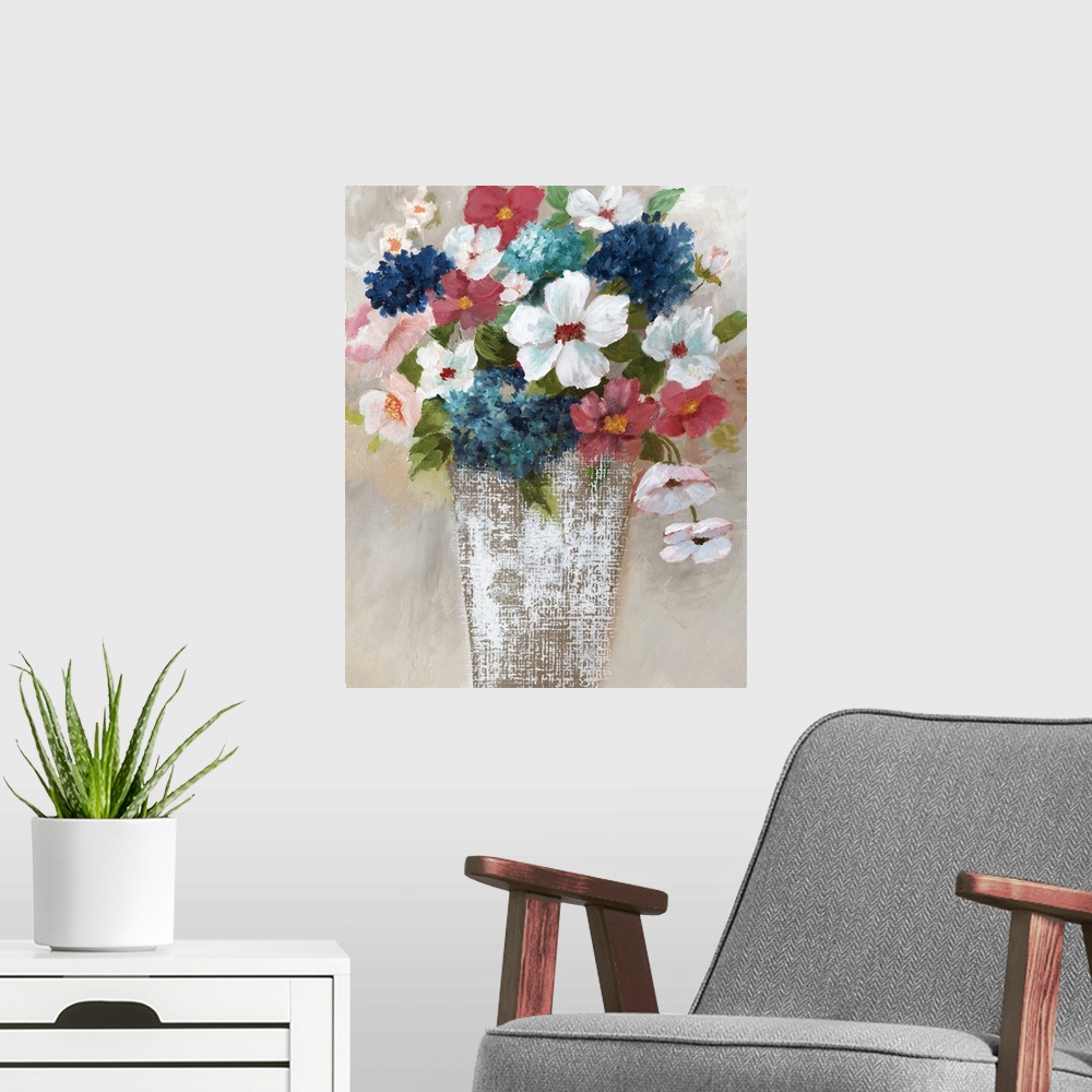 A modern room featuring Contemporary painting of a white linen textured vase filled with flowers of red, white and blue.