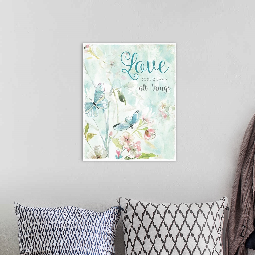 A bohemian room featuring Love Conquers