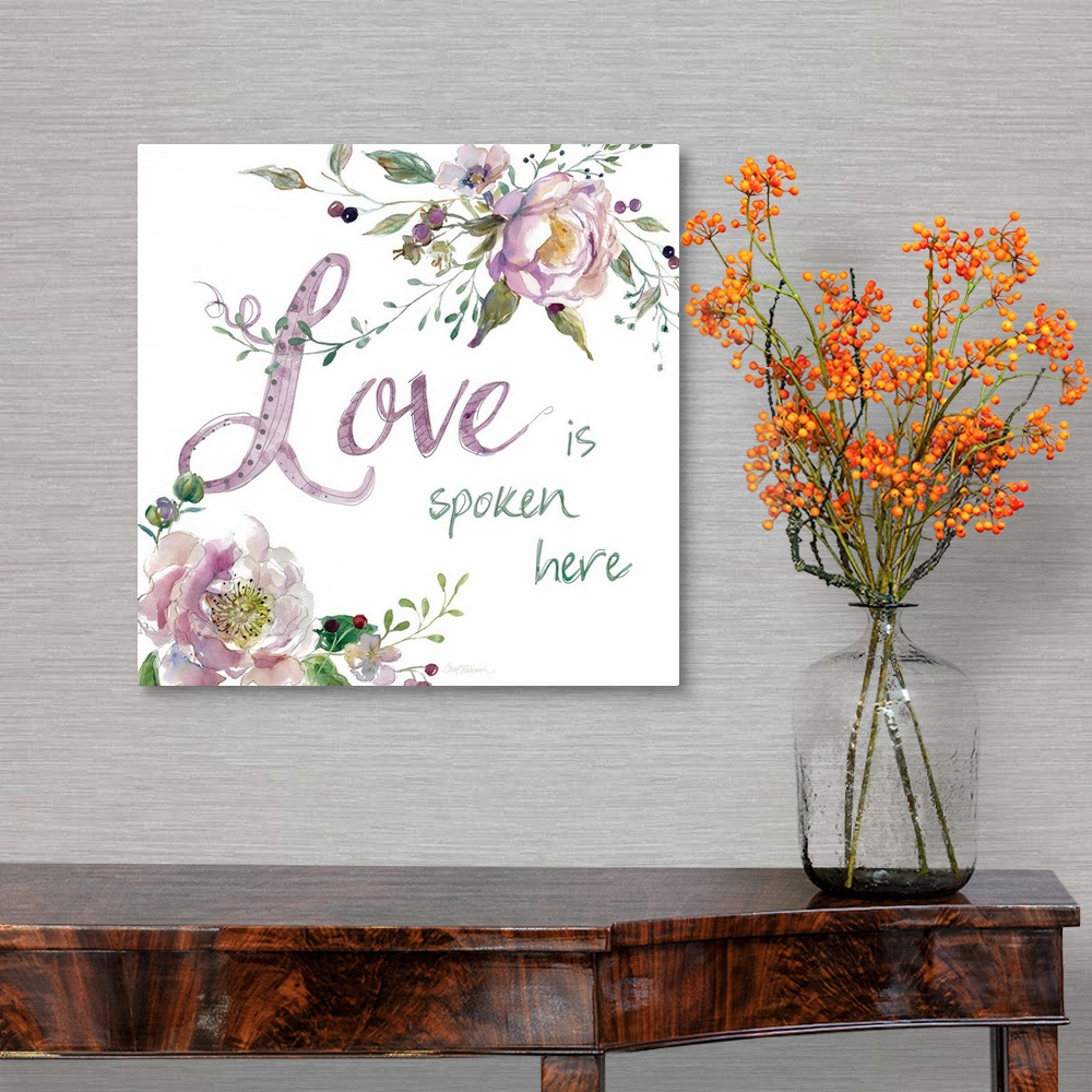 A traditional room featuring "Love is Spoken Here" with water color flowers.