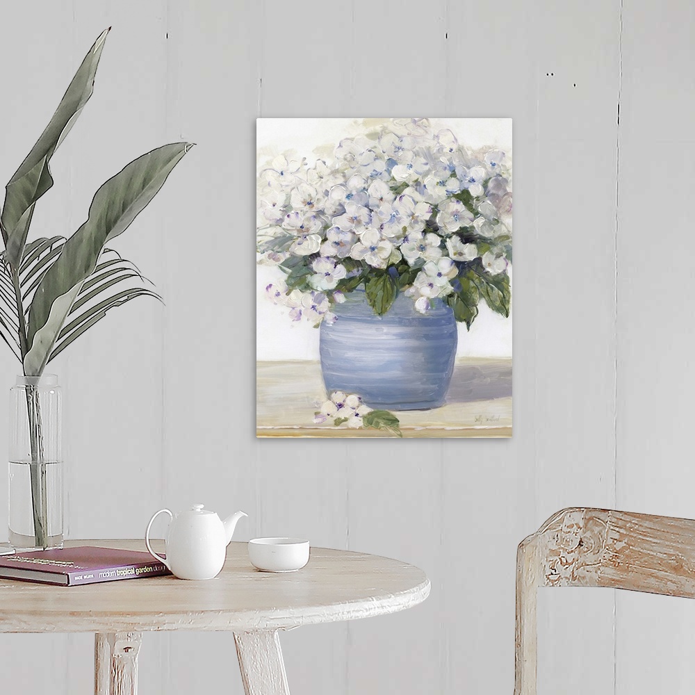 A farmhouse room featuring Large still life painting of arranged hydrangeas on a table.