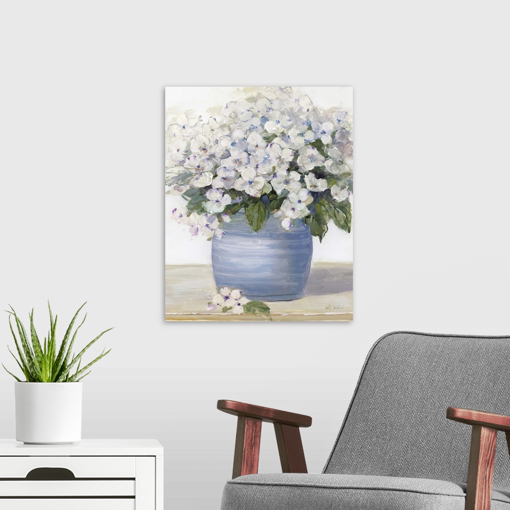 A modern room featuring Large still life painting of arranged hydrangeas on a table.