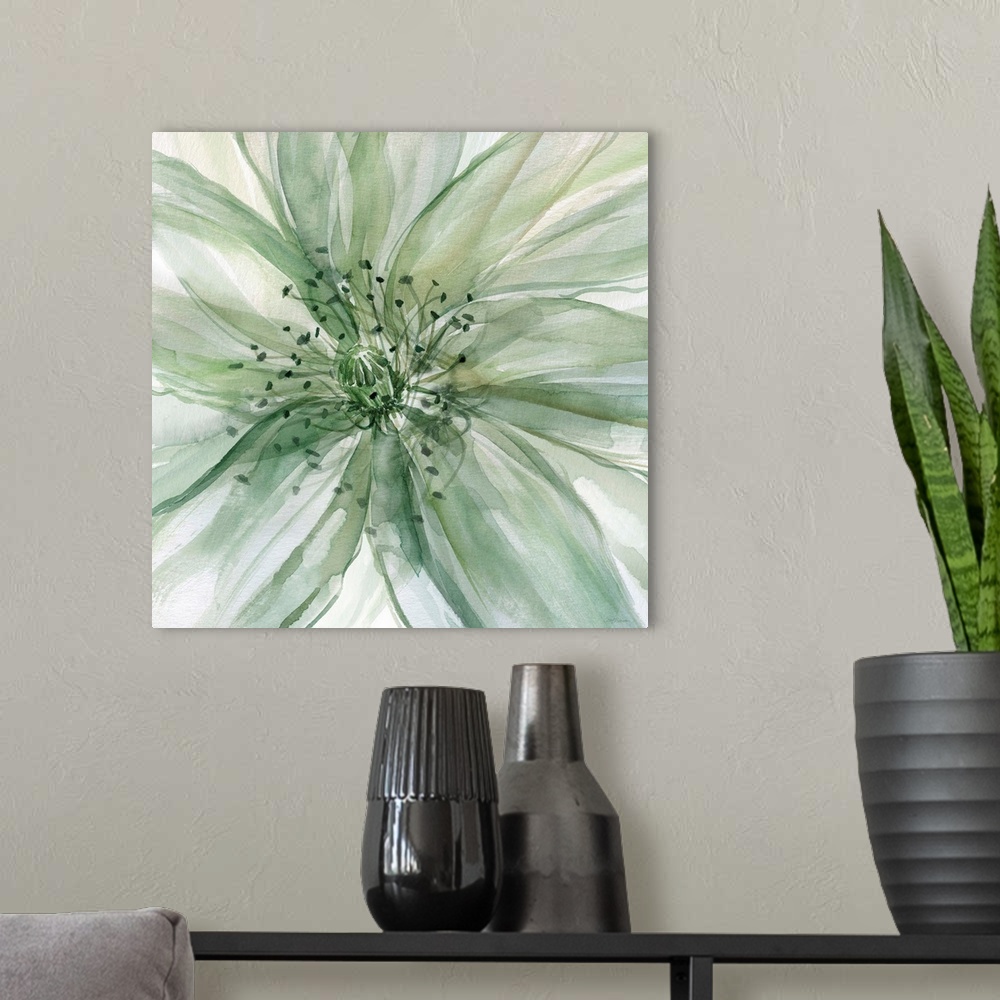 A modern room featuring Square watercolor painting of a large flower in shades of green taking up the whole frame.
